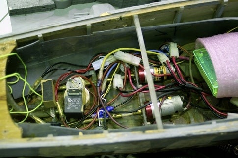 The water pump and motor inside a DIY battleship.