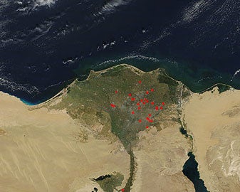 Fires are burning on the fertile Nile Delta in Egypt, as seen in this satellite image. Unusually hot heat signatures, marked with red spots, are usually seen in this region in October and November as farmers burn leftover straw from rice harvests.