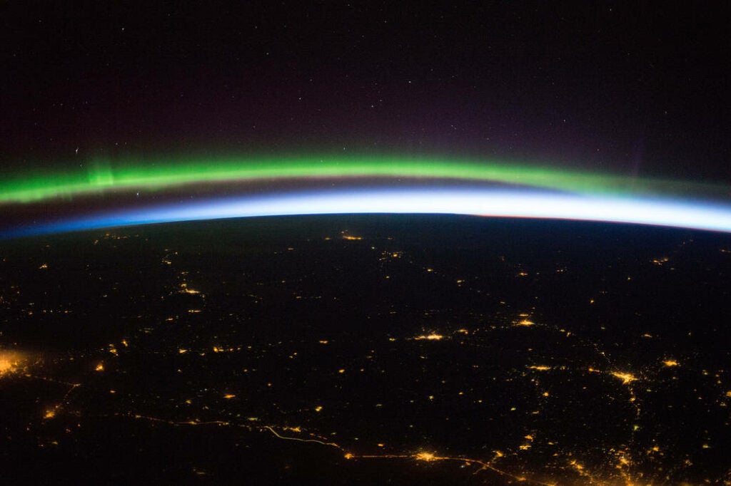 earth at night with aurora