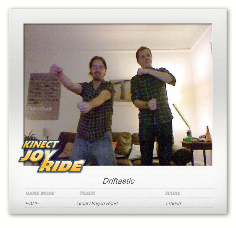My friend Jim and me playing Kinect Joy Ride. Some of the Kinect titles can submit photos taken in-game to the site Kinectshare.com for downloading or Facebooking