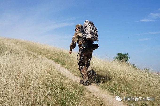 Solider walking on a hill
