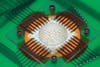 The compound eye camera mounted on a circuit board, so researchers can hook it up to control electronics.