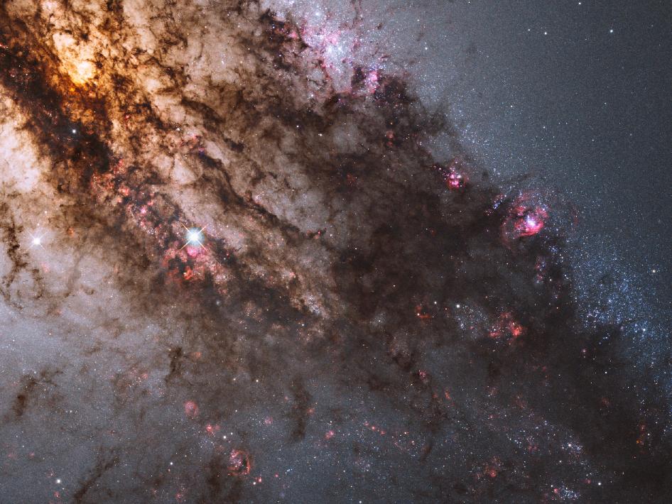 This image, from Hubble's Wide Field Camera 3, shows the chaos of star birth, dust, and collision out in the giant elliptical galaxy Centaurus A. Read more <a href="http://www.nasa.gov/multimedia/imagegallery/image_feature_2192.html?utm_content=SPACEdotcom&amp;utm_campaign=seo%2Bblitz&amp;utm_source=twitter.com&amp;utm_medium=social%2Bmedia">here</a>.