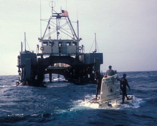 The Woods Hole Oceanographic Institution, with help from the Office of Naval Research, realized a decade-long dream of manned deep-sea exploration in June of 1964, with the commissioning of <em>Alvin</em>. Allyn Vine, a scientist at WHOI who was the prime mover behind the project, inspired the name of the three-person deep-sea vehicle. Vine named <em>Alvin</em>'s tender, the 105-foot catamaran <em>Lulu</em>, after his mother. A pair of craftsmen from Cape Cod constructed <em>Lulu</em> from two surplus Navy pontoons.