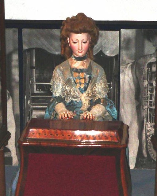 This prettily begowned automaton can breathe, blink, play the harpsichord, and even take a bow when she's finished with her song. She runs like clockwork because her viscera are clockwork: she was a product of the imaginations and deft hands of virtuosic Swiss clockmakers Pierre and Henri-Louis Jaquet-Droz.