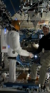 Here it is, folks, the first human-humanoid handshake to ever take place in space. One small shake for human and humanoid kind... (see the video <a href="http://www.youtube.com/watch?feature=player_embedded&amp;v=grieVTdxsNI">here</a>).