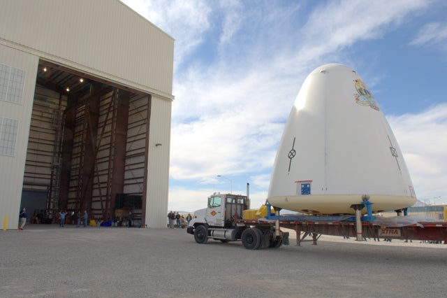 The Goddard capsule, a test vehicle in Blue Origin's New Shepard program, heads back to the barn after its first test flight.