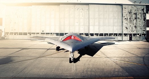In 2012, Popular Science was granted <a href="https://www.popsci.com/technology/article/2012-07/i-am-warplane/">unprecedented access to the Navy's X-47B</a>, a tailless, jet-powered, combat-ready autonomous unmanned aircraft designed to take off and land from the deck of an aircraft carrier. And since our February visit to the Navy's Patuxent River proving ground the X-47B has come a very long way. After a summer of testing on the ground, the two demonstration aircraft have performed complete steam catapult launches from a terrestrial runway at Pax River and even the first carrier deck operations conducted with an X-47B aboard the aircraft carrier USS Harry Truman. That's impressive on two fronts: First, because the X-47B is almost entirely autonomous, a combat jet aircraft that pilots itself based on orders programmed into its robot brain before flight and updated as the mission progresses. That makes it the most advanced autonomous combat system we've ever seen this far into development. But perhaps even more astounding, it's a U.S. military combat jet development program that is running on schedule. A full carrier operations demonstration is slated for the first half of 2013, and it looks like the X-47B program is going to meet its deadline. Wonders never cease.