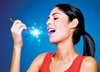 woman appearing to eat white dwarf star on a spoon