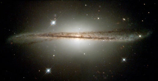 Hubble Catches a Warped Spiral Galaxy in Profile
