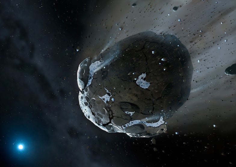 This is an artist's impression of a rocky and water-rich asteroid being torn apart by the strong gravity of the white dwarf star GD 61. Similar objects in our solar system likely delivered the bulk of water on Earth and represent the building blocks of the terrestrial planets. Link: NASA Press release