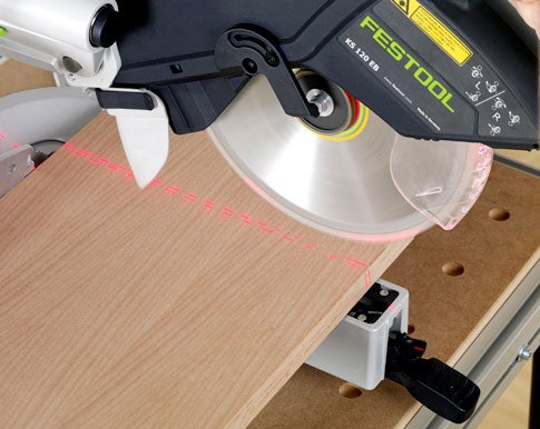 The Kapex's laser guide shows where the 2.5-millimeter blade—among the thinnest in a miter saw—will remove material.