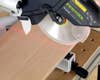 The Kapex's laser guide shows where the 2.5-millimeter blade—among the thinnest in a miter saw—will remove material.
