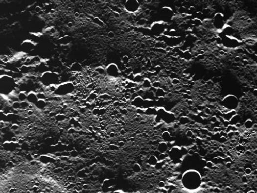 Messenger's Wide Angle Camera imaged this never-before-seen patch of terrain near Mercury's North Pole during its first pass over the region after the camera was activated. At this point Mercury is just 280 miles above the surface. The spacecraft's elliptical orbit brings it as close as 125 miles from the surface and as far away as 9,300 miles.