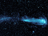 A speeding star called Mira can be seen leaving an enormous trail in this image from the Galaxy Evolution Explorer.