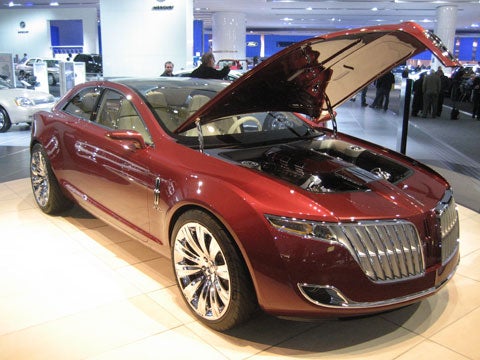 The Lincoln MKR concept, a four-door coupe, uses a 3.5-liter gasoline twin-turbocharged V6 to achieve the same horsepower as a V8 without sacrificing fuel economy. The TwinForce engine cranks 415 horsepower and 400 pound-feet of torque, running off E-85 ethanol and LED technology (is there anything those little guys can´t do?).