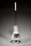 This steel and plastic model of the Mercury spacecraft is identical to the one shown at the first public announcement, in 1959, of the pilots selected for Project Mercury.