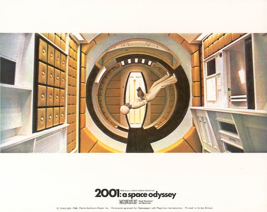 Kubrick's landmark "2001: A Space Odyssey" (1968) covers an awesome evolutionary sweep as it ranges from the "Dawn of Man" on the African plains to a 21st century computer-run spaceship — "Hello, HAL" — ferrying astronauts to the moon and later to Jupiter as they seek to unravel the mysteries of human existence. During pre-production Kubrick collected vast amounts of research on what life in space would be like in the near future, consulting the aerospace industry, university researchers and R&amp;D; labs. The idea of a rapidly spinning centrifuge that could harness centripetal force to maintain earthly levels of gravity was popular in space talk at the time, so Kubrick decided the film's Discovery spaceship should prominently feature a copy. He hired Vickers Engineering Group to create a $300,000 imitation centrifuge (top rotational speed: 3 mph). The Ferris wheel-like set allowed Kubrick to film famous scenes that appear to show an astronaut jogging in a vertical circle or walking up the round sides of the ship. "Being a production designer, I've always felt that the centrifuge was so far ahead of its time and still is, and I admire the intense research Kubrick did to commit to build it, and simultaneously the camera and playback systems that had to be adapted in order to shoot it," Podesta says. "I still watch those images on the centrifuge in awe."