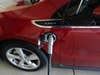 httpswww.popsci.comsitespopsci.comfilesimport2013importPopSciArticles2011-chevrolet-volt-plugged-into-coulomb-technologies-240v-wall-charging-unit_100392869_l.jpg