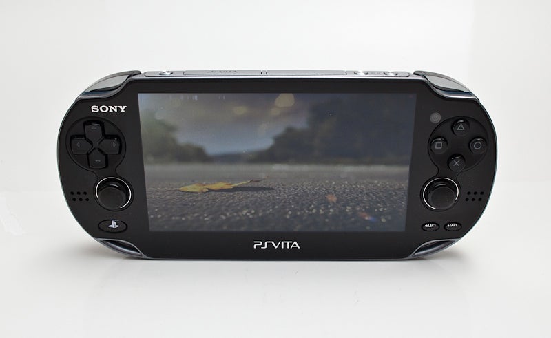 The PlayStation Vita head-on, showing the intro to <em>Wipeout: 2048</em>.