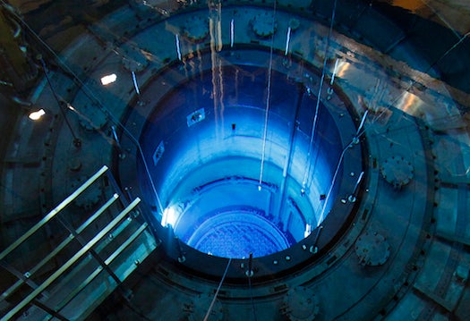 The open reactor with fuel rods are seen in a water pool inside the nuclear power plant Muehleberg during a yearly revision in Muehleberg August 16, 2012. Since the commission of Muehleberg nuclear power station in 1972, the owners BKW FMB Energie, conducts an annual review of the plant, with more than 600 additional personnel brought from around the world to help with the assessment. This year some 32 fuel rods out of 240 were replaced. Picture taken August 16, 2012. REUTERS/Ruben Sprich (SWITZERLAND - Tags: SCIENCE TECHNOLOGY ENERGY)