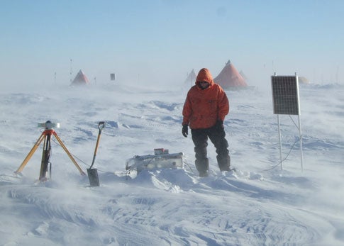 men on the snow in Antartica
