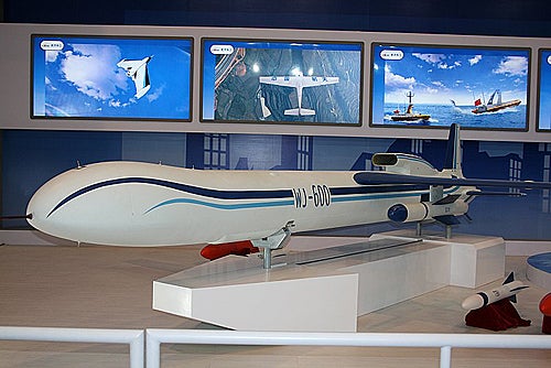 WJ-600 wasn't always stealthy. Four years ago at Zhuhai 2010, CASIC showed the WJ-600 as an unstealthy attack drone, with one video implausibly featuring it attacking a U.S. destroyer. With the WJ-1 as China's UCAV, the WJ-600 has gone a facelift (see above).