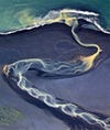 To create this lovely photo of rivers running through Iceland's volcanic ash, photographer Andre Ermolaev took to the skies. See more from this series at at <a href="http://500px.com/andreabe">500 px</a>.