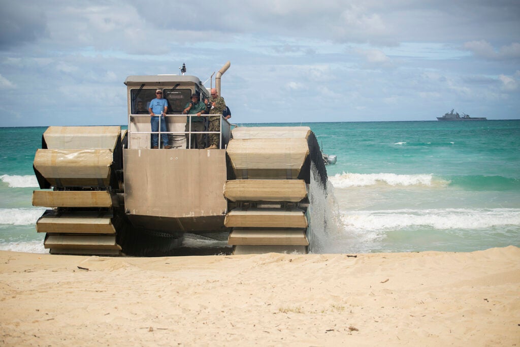 Ultra Heavy-Lift Amphibious Connector swam from the USS Rushmore to land on a Hawaiian beach as part of military exercises there.