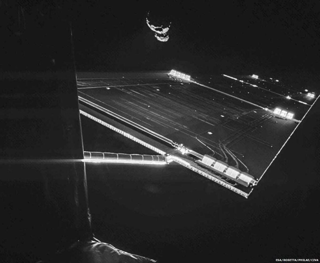 The Rosetta spacecraft beamed this to Earth on Sunday: an over-the-shoulder selfie with its intended. Visible are the comet toward which Rosetta has travelled for more than a decade, the edge of the craft, and one of its ~46-foot solar panels. The mission team is now reviewing possible landing sites on the comet’s surface. <a href="https://www.popsci.com/article/science/armored-trucks-unborn-birds-go-airborne-and-other-amazing-images-week/"><em>From September 12, 2014</em></a>