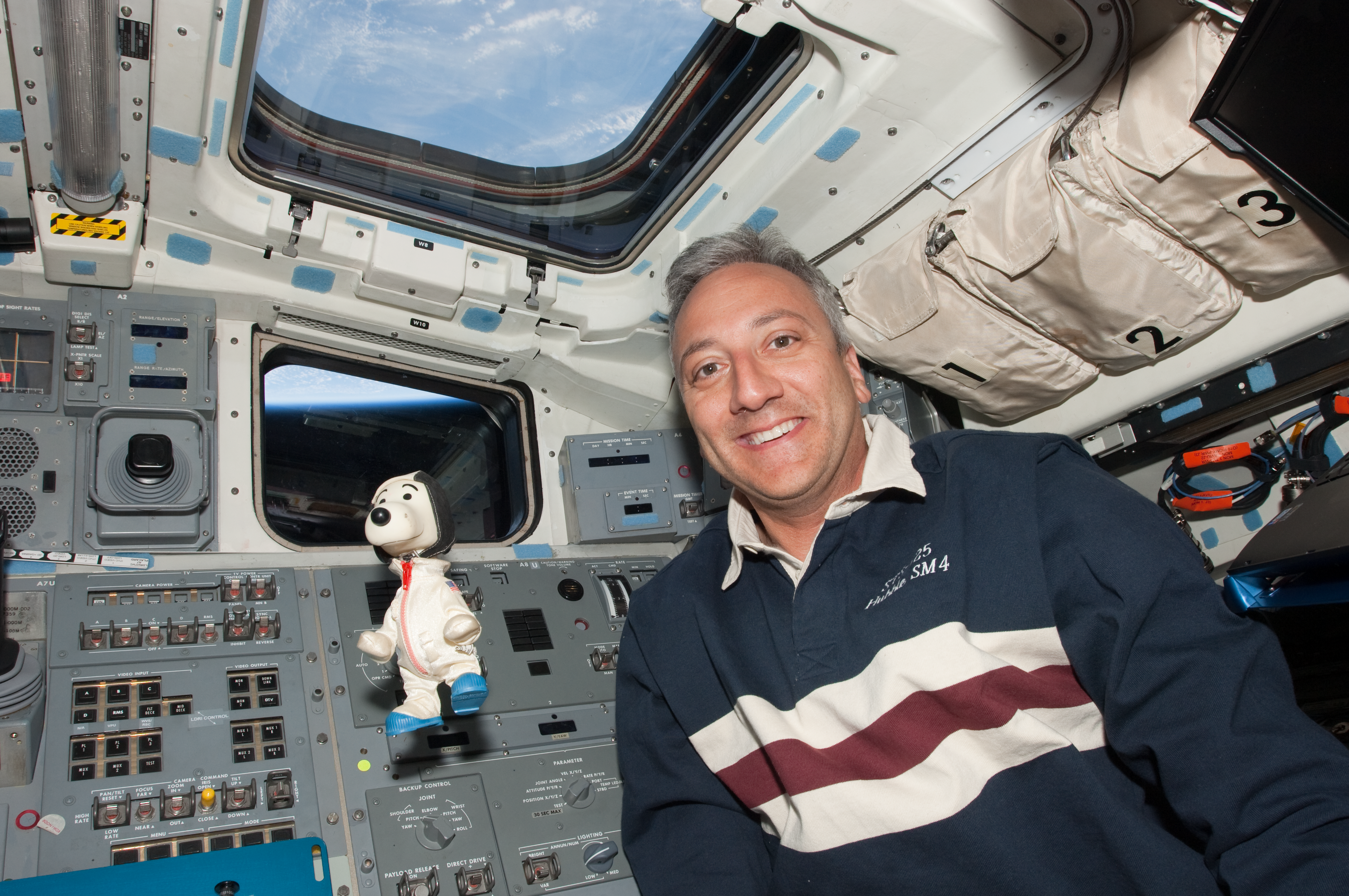 Massimino with his co-pilot, Snoopy.