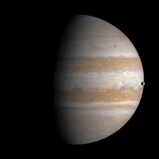 In January 2001, <em>Cassini</em> swept past Jupiter en route to Saturn. As it did, scientists directed the unmanned craft to take a series of photos, some of which captured the transit of the volcanic moon Io at Jupiter's limb. Benson combined 27 frames into nine composites, which he then stitched together.