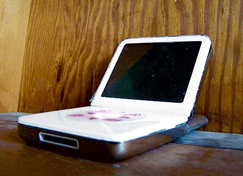 An iPod that's been modified so the screen tilts up at a 45-degree angle, like a laptop.
