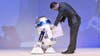 Earlier this year, Chinese home appliances company Haier unveiled a life-size, remote-control R2-D2. The robot also doubles as a fridge. With this week's release of <em><a href="https://www.popsci.com/star-wars-fanboy-review-best-one-after-empire-strikes-back/">Star Wars: The Force Awakens</a>,</em> the company announced that its roving fridge will be showcased at the Consumer Electronics Show in Las Vegas next month. "The fridge is a faithful replica in terms of sound and movement," <a href="http://www.techradar.com/us/news/world-of-tech/the-r2-d2-fridge-is-finally-rolling-out-in-the-west-1311439/">according</a> to Haier. The droid/fridge is large enough to hold six beer cans, and has a high-definition laser projector built into it. Sounds (literally) super cool, but here's the catch: Haier <a href="http://mashable.com/2015/12/17/r2-d2-refrigerator-9000-price/#It493w73xgqx/">says</a> its R2-D2 will cost a steep $9,000.