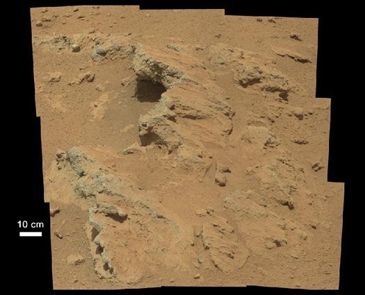 As we know, Opportunity and Spirit saw lots of evidence for water, largely in their exploration of minerals inside rocks. But with this image, scientists have the first observation of flowing water's influence. Right after Curiosity landed and sent its first pictures back, scientists thought they may have put down in an alluvial fan--an ancient runoff site, and a bullseye for the type of science Curiosity is designed to do. Very early in its mission, Curiosity found this gravel, which was once part of an ancient stream bed. This image shows the Martian rock outcrop where that gravel is found.
