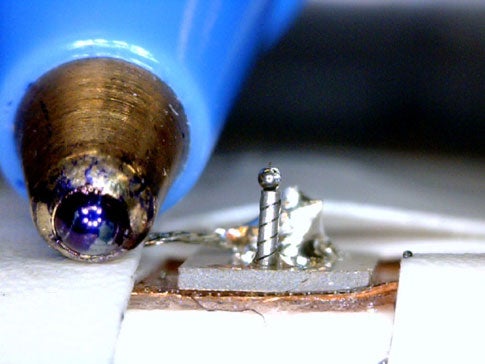 The 0.14-inch-tall motor nearly fits on the tip of a pen