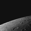 A high-resolution look at a previously unseen portion of Mercury's northern horizon. Visible in the lower right corner of the image is Mercury's terminator, the line between the light day side and dark night side of the planet. Smooth plains extend for large distances towards the horizon.