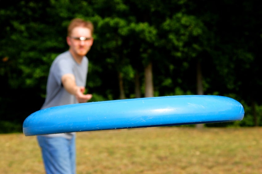 a man throwing the robotic frisbee of death