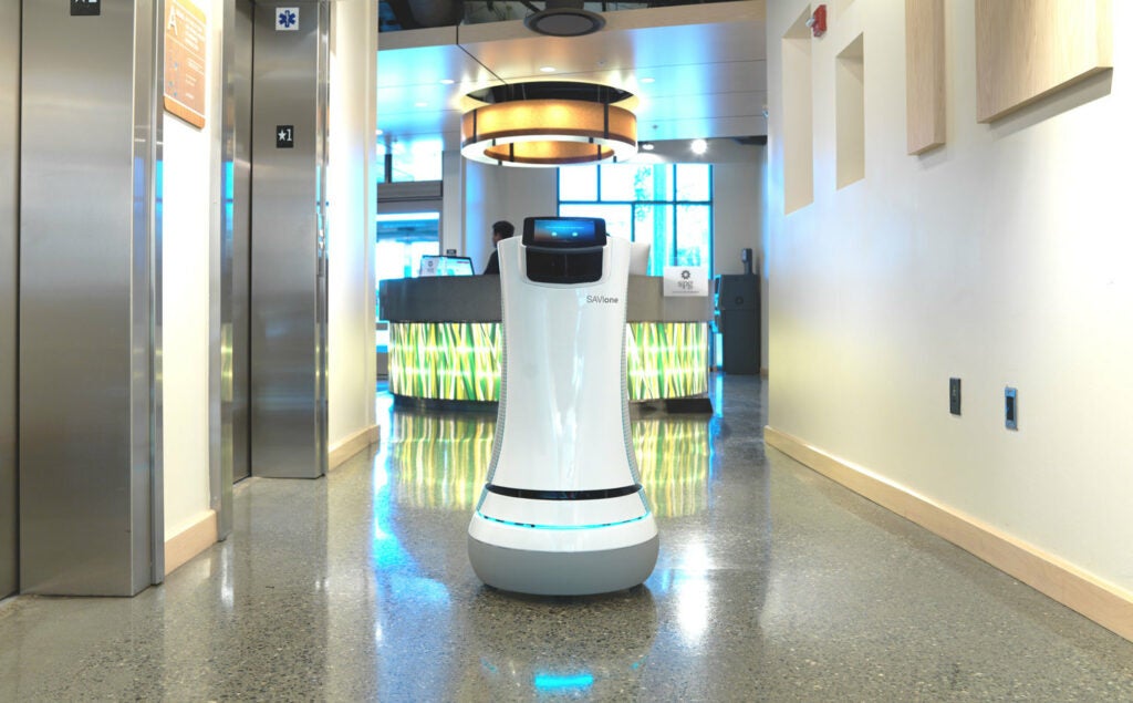 Savioke's SaviOne robot in a hotel hallway