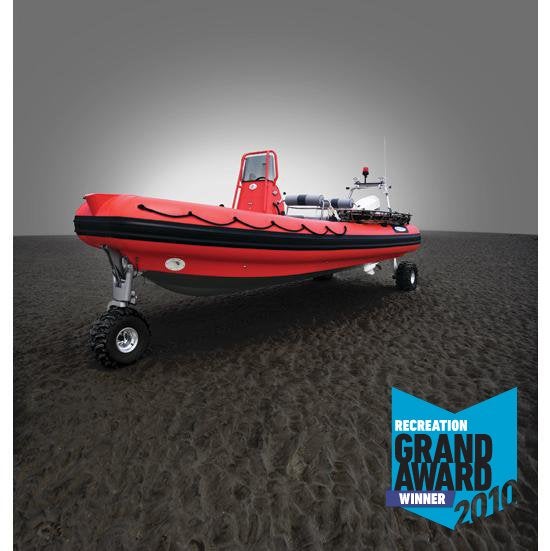 The first-ever commercial amphibious vessel with retractable all-wheel drive, the Sealegs rigid inflatable boat (RIB) allows boaters to launch and land nearly anywhere. On land, the 23-foot craft gets around on three 25-inch all-terrain tires. Each wheel is powered by its own hydraulic motor, while an onboard 24-horsepower motor provides the fluid. It tops out at 6 mph but can crawl over even the toughest terrain. The drive system adds just 335 pounds to the Sealegs's weight, so when the wheels are folded up and out of the way, it rides as well as any high-performance RIB. In boat mode, a 150-horsepower outboard motor propels the V-shaped aluminum hull to a top speed of 48 mph. Military and rescue organizations, including the Royal Thai Navy, are using the craft to quickly access hard-to-reach locations and more easily transfer accident victims from the water to ambulances. But for pleasure boaters, Sealegs simply makes entering and leaving the water as easy as it gets. See more at the Best of What's New site. <strong>Jump To:</strong>