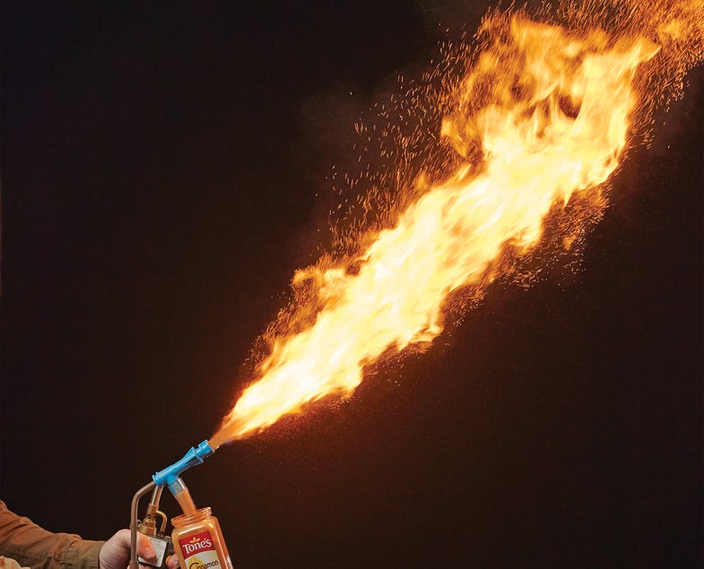 A jet of burning cinnamon shows just how flammable fine organic powders can be in a stream of pure oxygen.