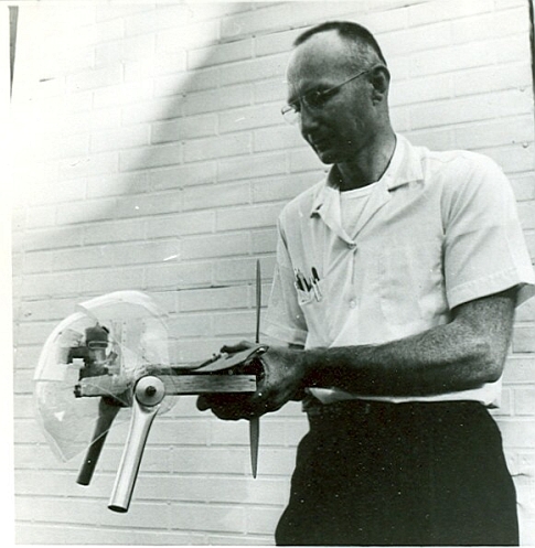 In Hampton, Virginia, Bertelsen demonstrates the hovering ability of his arc-wing VTOL model to aviation experts. The craft took off vertically and hovered four feet off the ground.