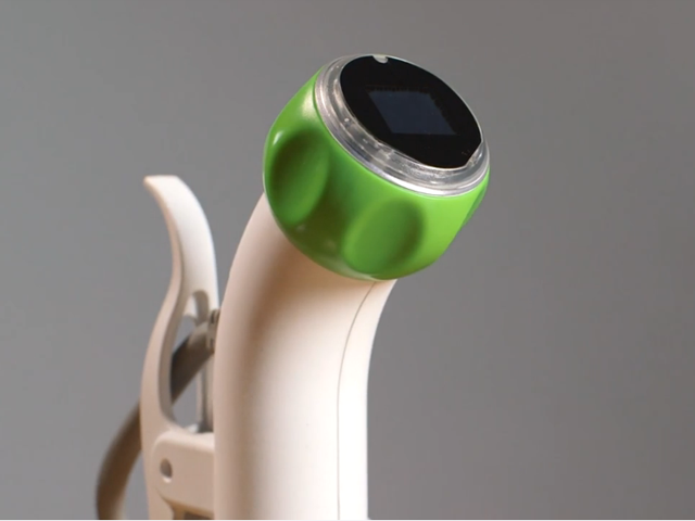 The lovingly designed Nomiku home immersion circulator has a dial on the end to set temperature.