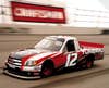 RED, WHITE AND NEW TO NASCAR:: Toyota tests one of its seven tundra trucks before race day at Daytona International.