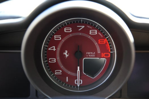 Dominating the instrument panel is the tachometer; speed is relegated to a much smaller gauge below and to the right, as if to say "no need to look down, your speed is 'too fast.'"