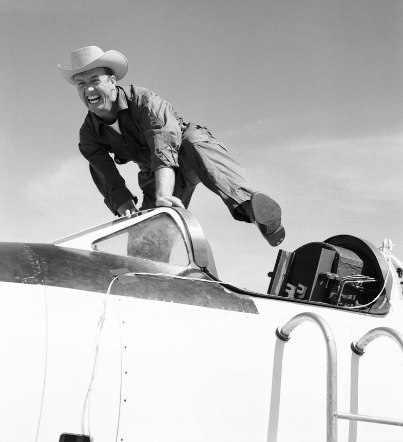 Joe Walker leaping over the open cockpit of an X-1A, a second-generation X-1, in 1955.