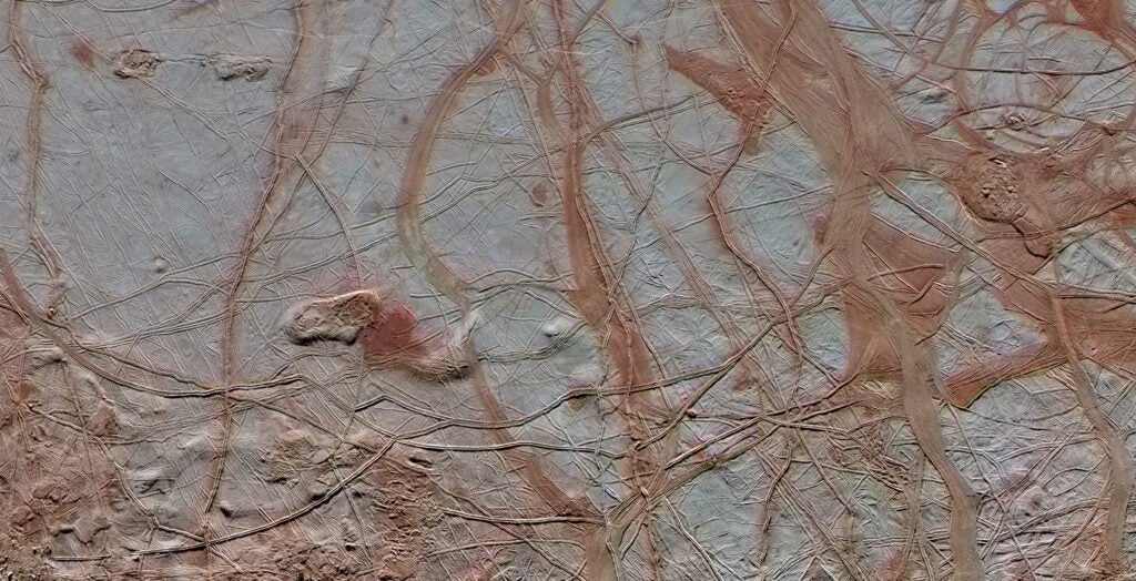 white surface with reddish lines scattered across it