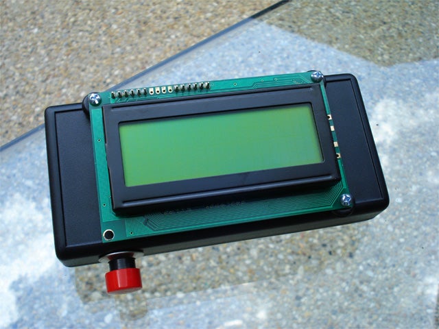 A handheld electronic device with an LCD screen.