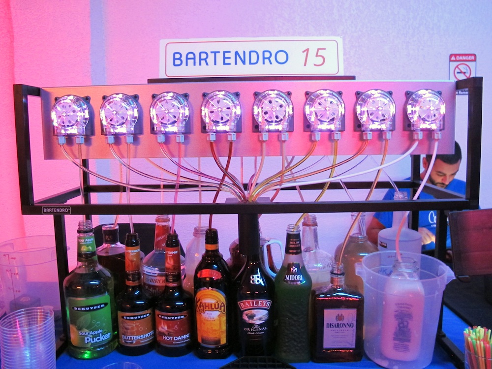 Less subtle was Bartendro 15, a Kickstarter-funded robot bartender created by <a href="http://partyrobotics.com/">Party Robotics</a>. Bartendro 15 takes up to 15 bottles of booze or mixers and then populates a drink menu on a browser, based on the ingredients it has. When it runs out of an ingredient, it deletes those drinks as menu options.