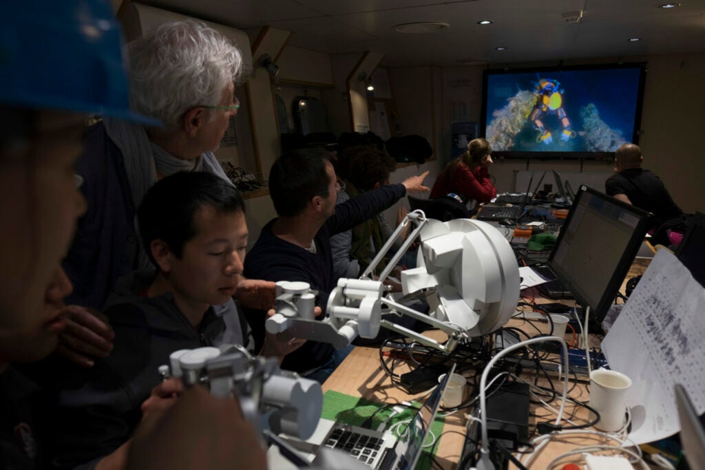 Researchers monitoring OceanOne from their Control Room